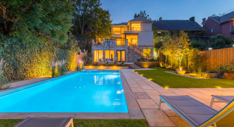 Forest Hill Estate front yard with elegant landscaping.