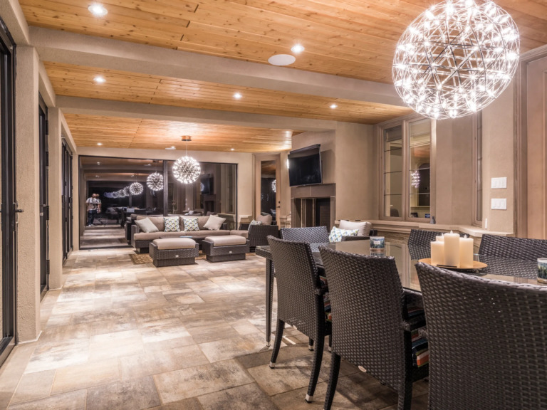 Four Seasons Estate backyard patio with stone flooring