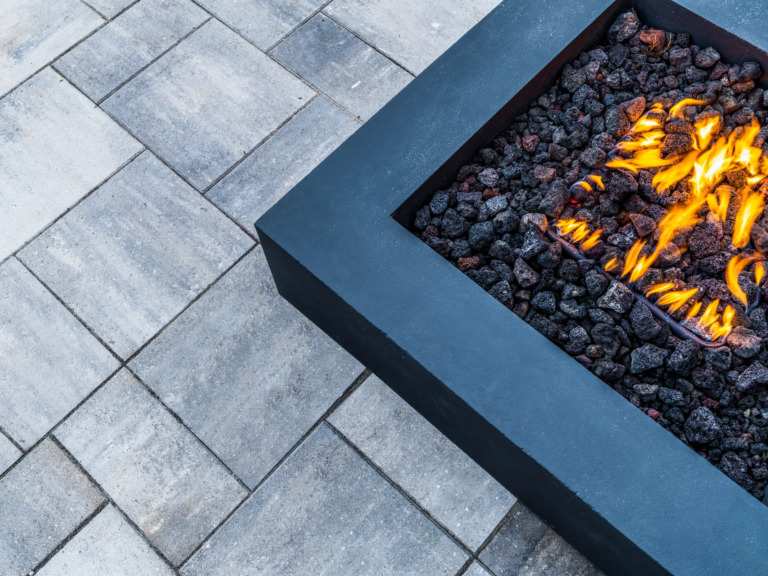 Spacious patio area in Four Seasons Estate backyard