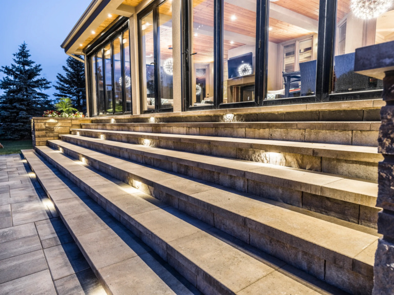 Modern backyard deck and landscaping at Four Seasons Estate