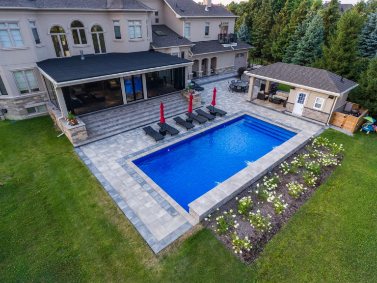 Luxurious deck design with wood and stone elements