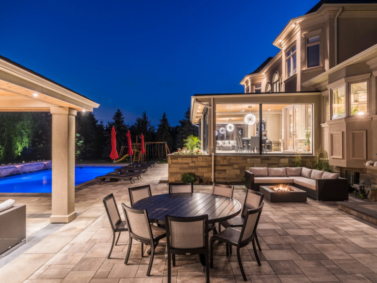 Four Seasons Estate patio with outdoor seating and planters