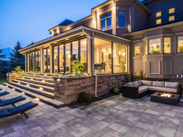 Four Seasons Estate garden with a stone path and deck