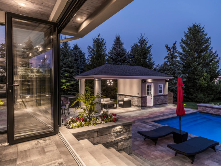 Stone walkway leading to the deck at Four Seasons Estate