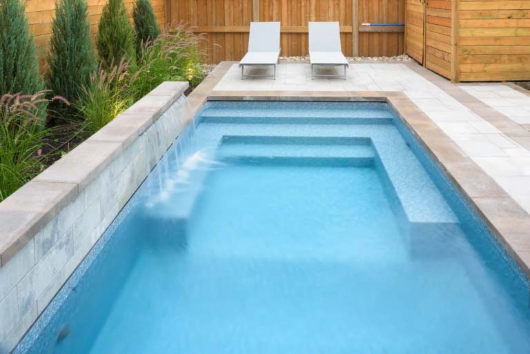 Pathway to the pool, featuring a clear view of the pool area.