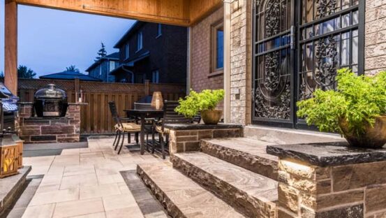 Temple project - detailed view of the landscaping with stone features and lush greenery.