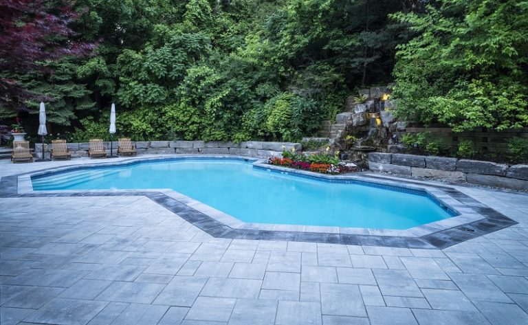View of a high-rise office building with a reflective glass surface and a clean architectural style.