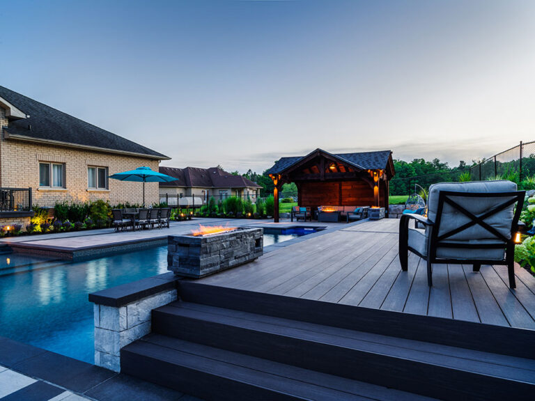 Contemporary outdoor space with a custom-designed pool and outdoor furniture.