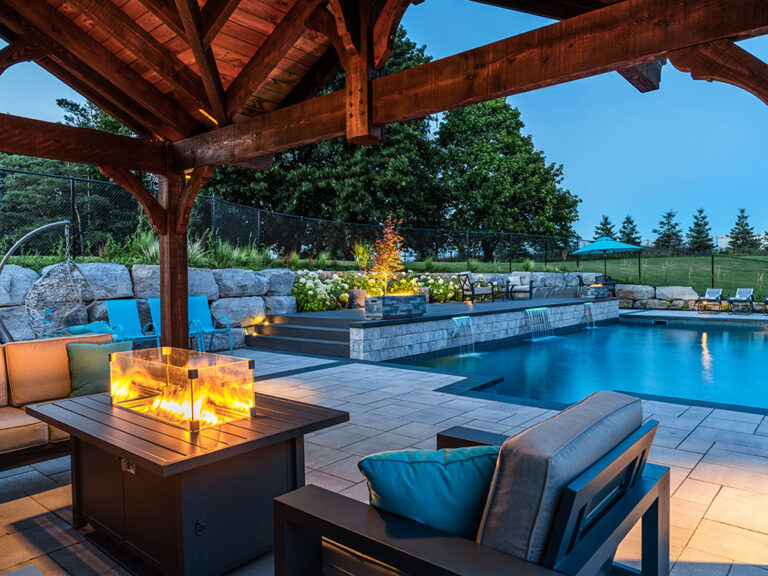 Luxurious outdoor space with custom-designed pool and manicured garden."
