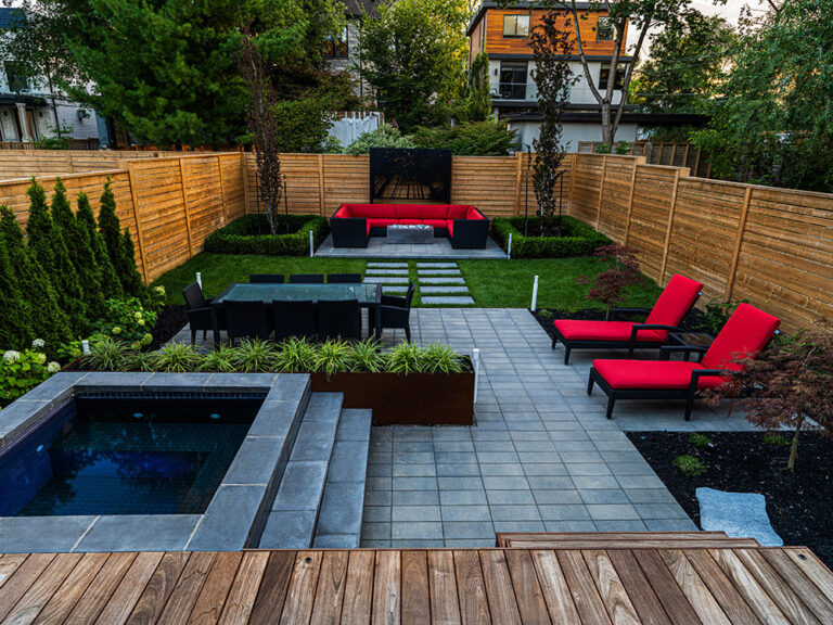 Chic backyard design with a contemporary pool and surrounding greenery.