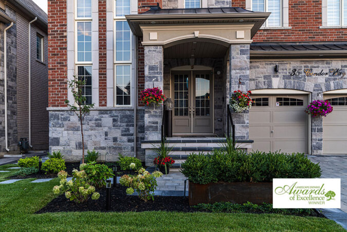 Luxurious backyard with modern pool, patio, and landscaping featuring a spacious seating area, sleek design, and greenery in a residential setting.