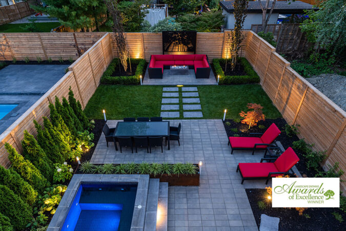 Sophisticated backyard with contemporary design elements and modern pool.