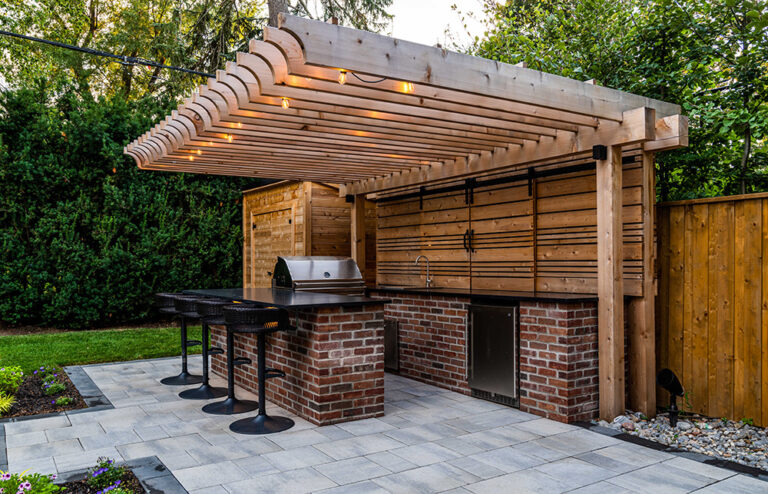 Backyard design with a modern swimming pool and clean landscaping.