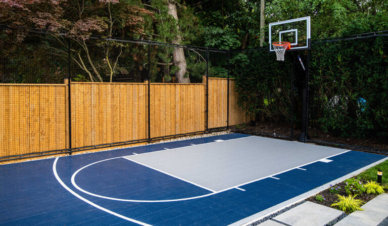 Elegant outdoor living space with a stylish patio and modern swimming pool.