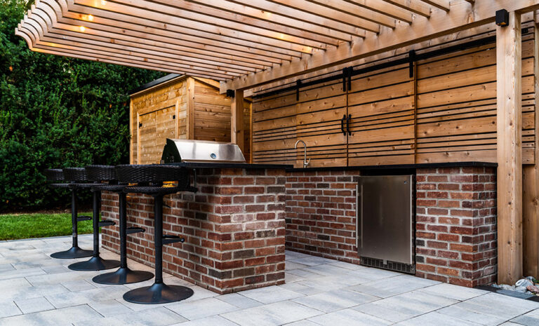 Beautifully landscaped backyard with a swimming pool and modern outdoor seating.