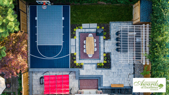 Luxurious backyard design featuring a pool and contemporary outdoor living space.