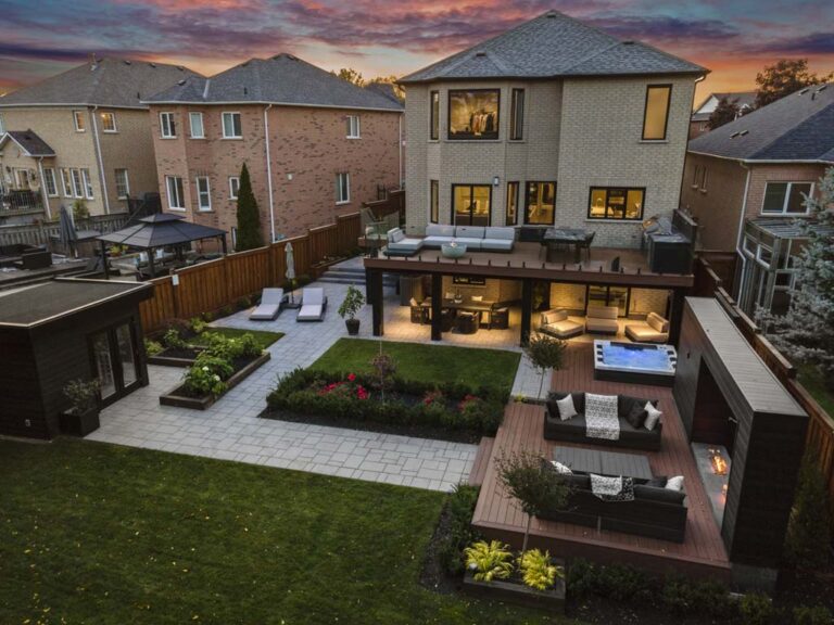 Modern backyard with stylish seating and natural surroundings