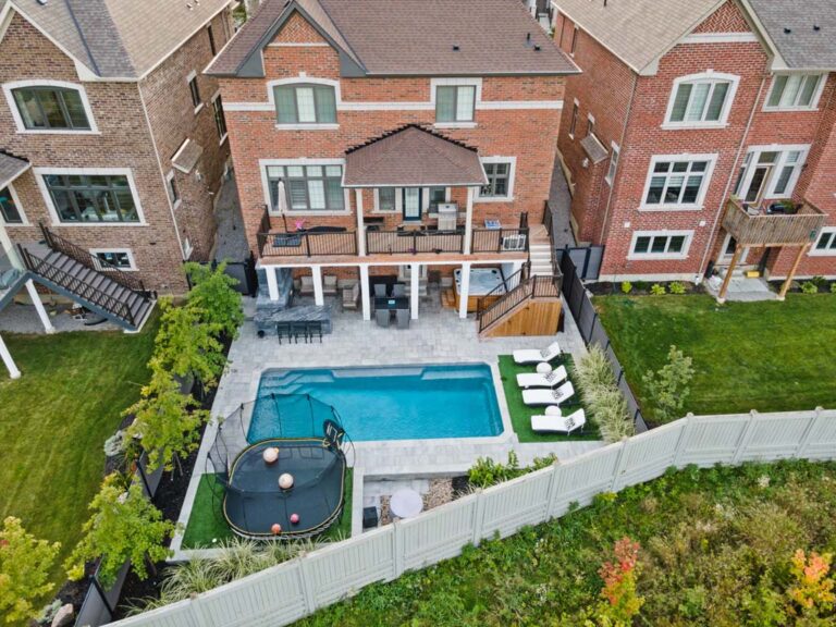Neatly organized backyard with seating area