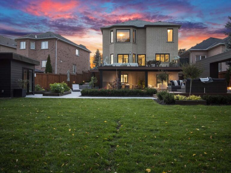 Outdoor space with a wooden deck and green surroundings