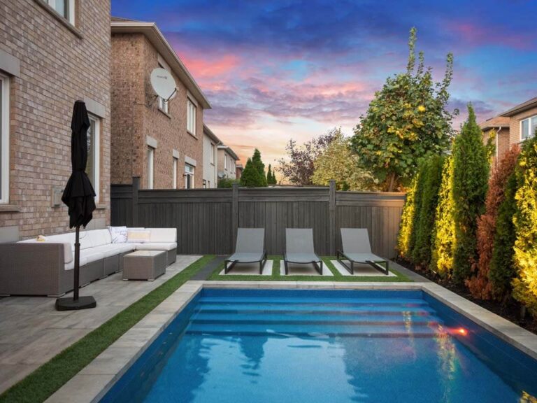 Contemporary backyard with a mix of greenery and hardscaping