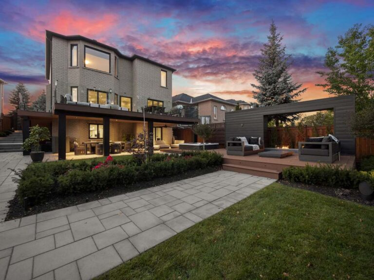 Modern outdoor space with stylish seating and landscaping