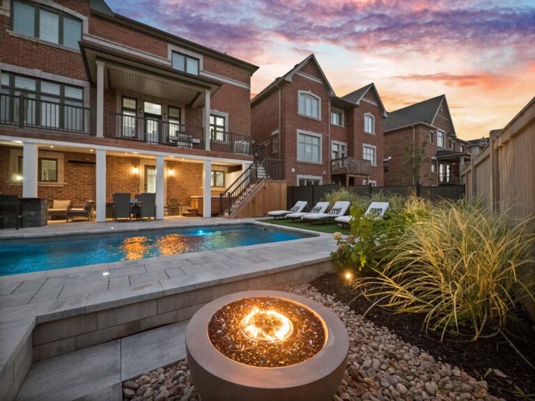 Outdoor dining area with wooden table and chairs