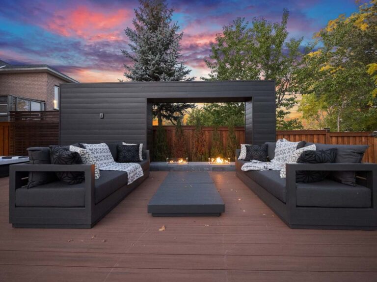 Chic backyard with a wooden deck and garden views