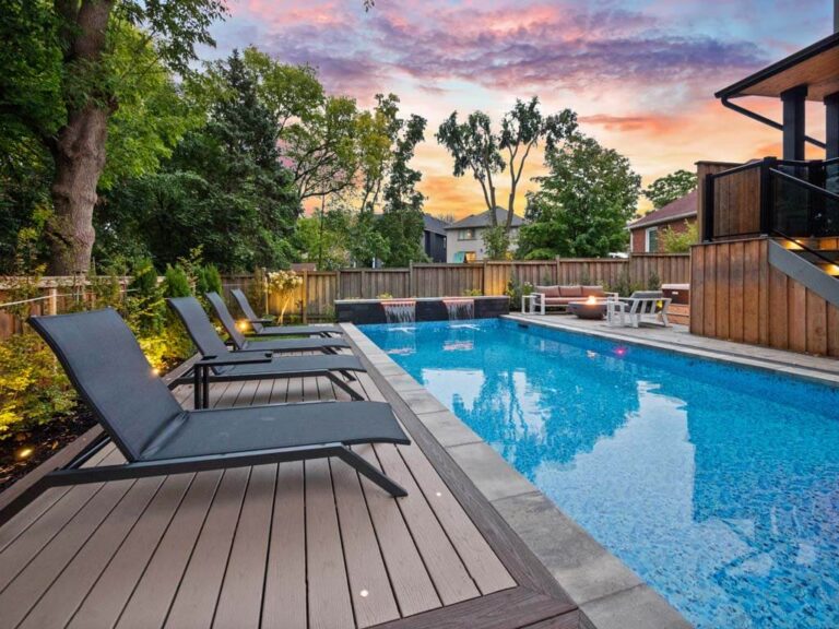 Luxurious backyard with a pool and stylish seating