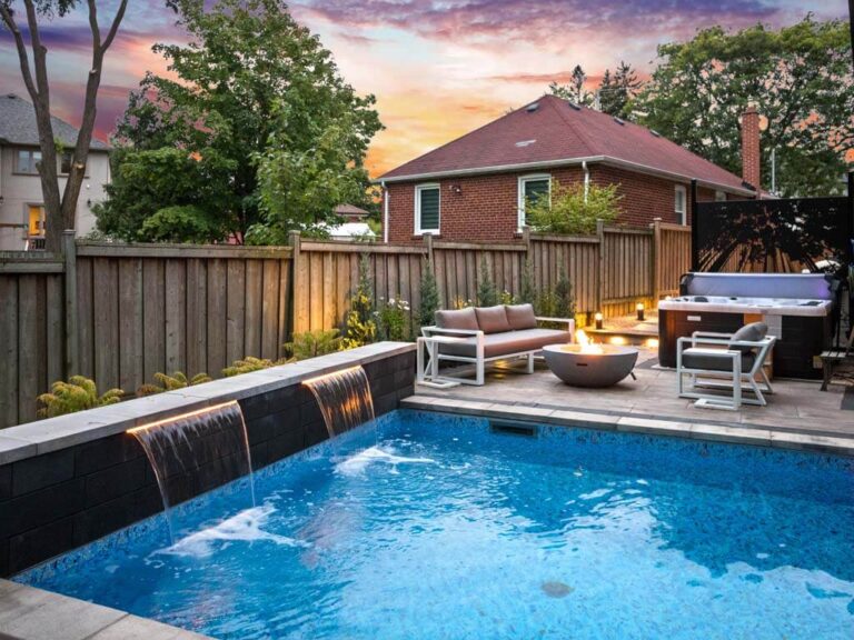 Outdoor area with a stone patio and garden views