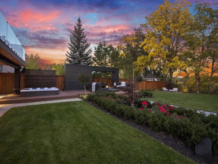 Luxurious outdoor space with a fire pit and lounge chairs