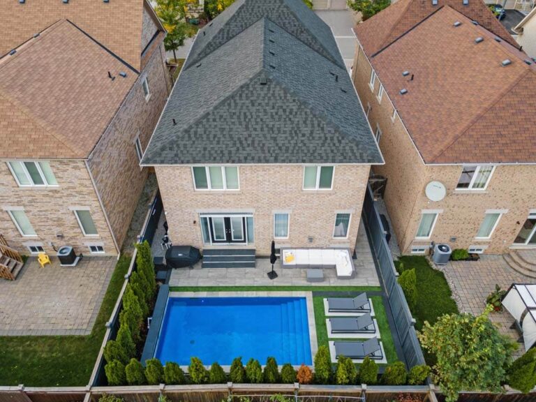 Outdoor space with a spacious lawn and garden design