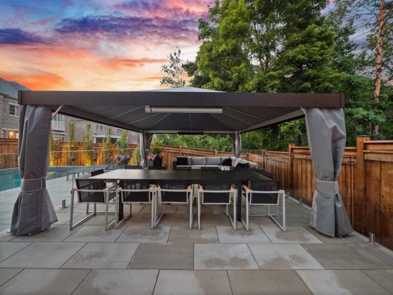 Cozy outdoor fireplace area with surrounding seating