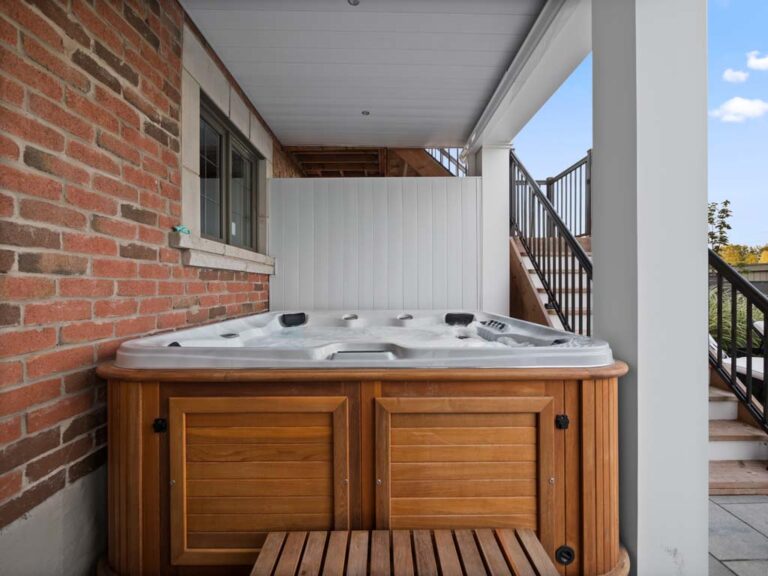 Lush backyard with pergola and seating area