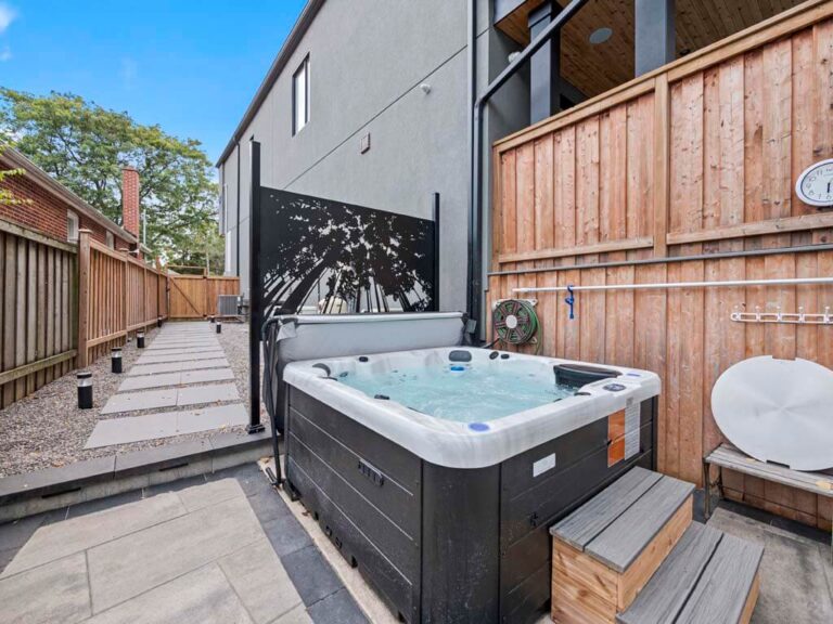 Chic backyard with a pergola and outdoor dining setup