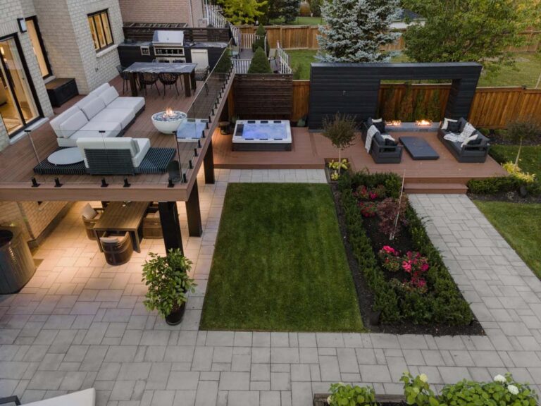 Outdoor area with a stone pathway and landscaped garden