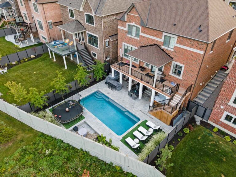 Simple backyard with plants and decorative stones