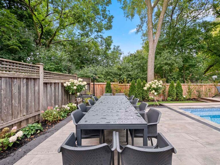 Contemporary outdoor area with stone paving and a garden