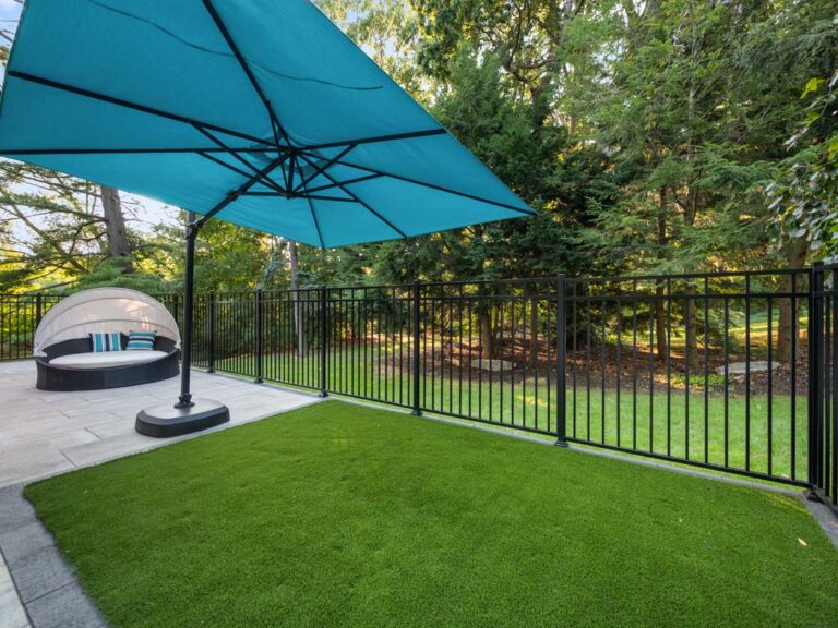 Outdoor space featuring a contemporary fire pit and surrounding seating
