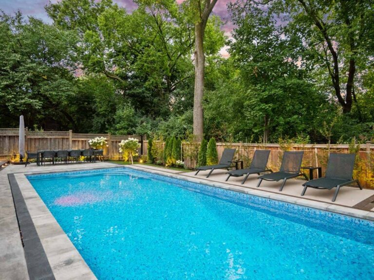 Stylish outdoor area with modern furniture and landscaping