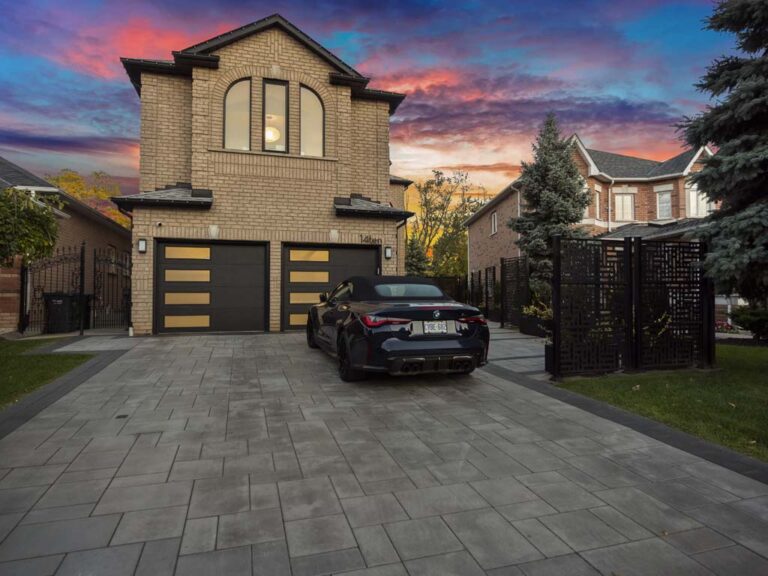 Stylish outdoor space with modern seating and a garden