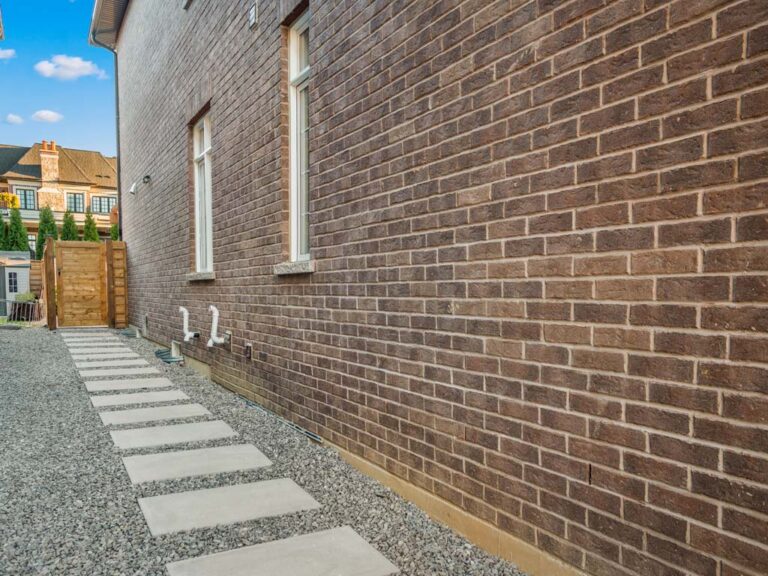 Modern backyard featuring a lounge area and greenery