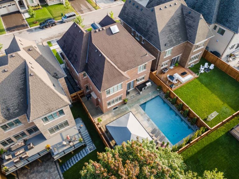 Inviting outdoor dining area with pergola and greenery