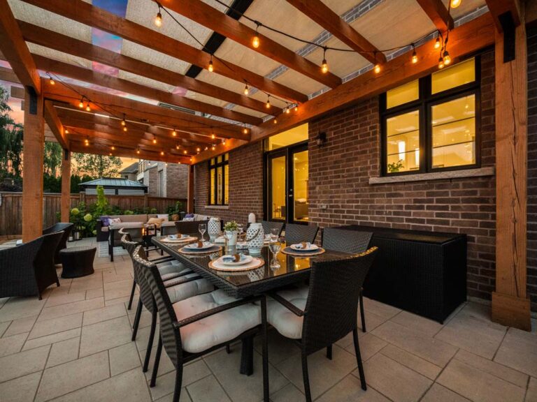 Luxurious backyard patio with seating area and garden