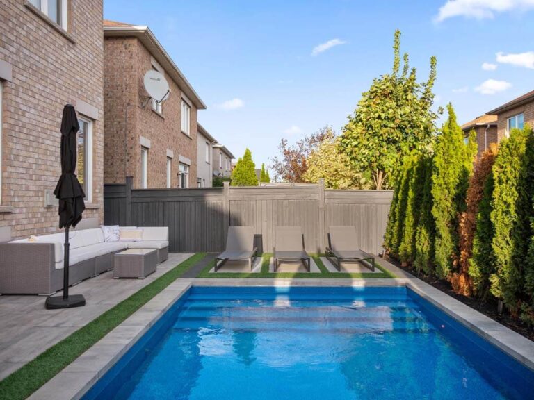 Outdoor area with wooden deck and comfortable seating