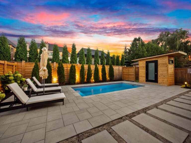 Modern backyard design with a pool and wooden deck