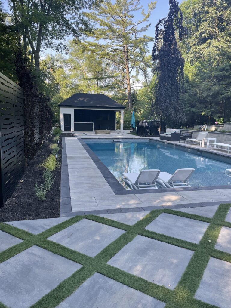 Contemporary backyard with a fire pit and comfortable seating
