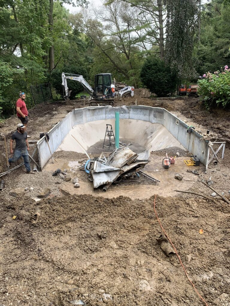 Elegant outdoor dining area with wooden table and chairs