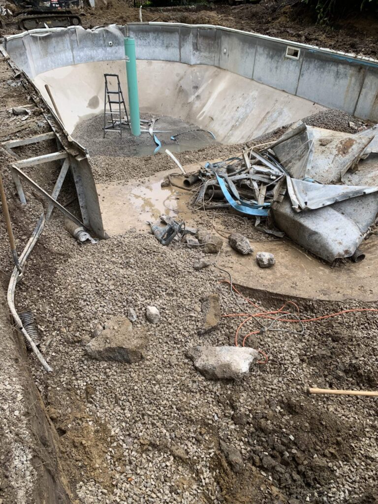 Modern backyard patio with stone flooring and outdoor seating