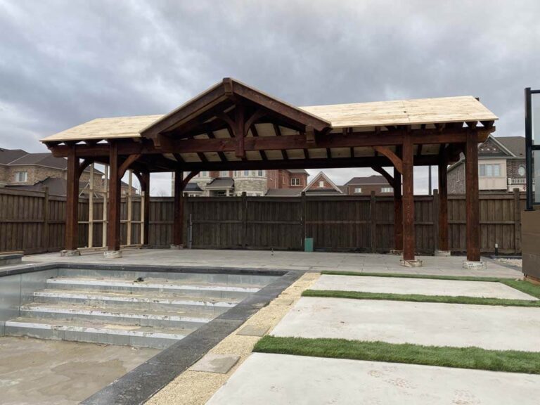 Charming garden area with stone elements and a variety of flowering plants