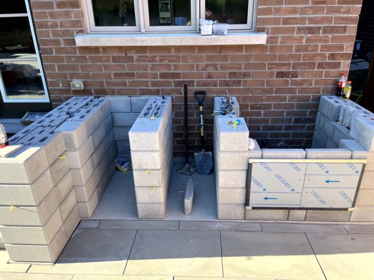 Custom wooden deck with built-in seating and planters